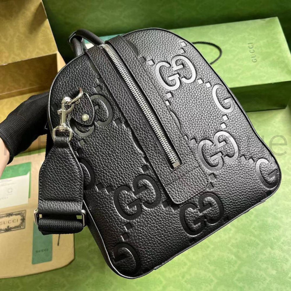 Средняя дорожная сумка Gucci Jumbo GG