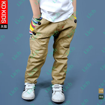 Брюки однотонные с вставками в разноцветную полоску