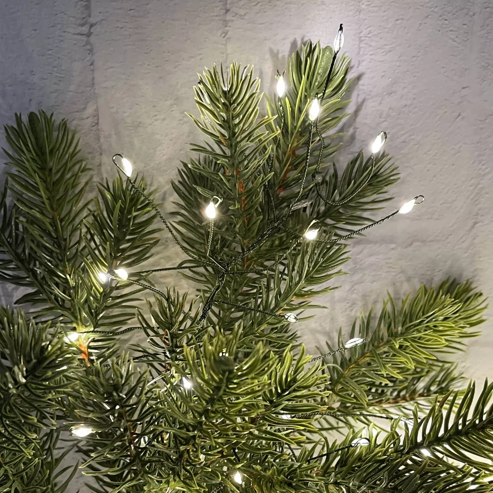 Светодиодная нить кластер 960 теплых белых ламп, 6 м., 8 режимов, зеленый провод, Christmas DeLuxe (87448)