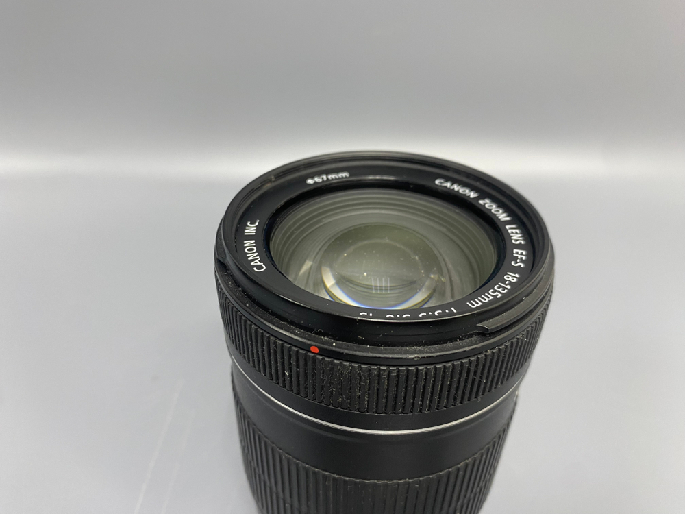 Canon EF-S 18-135mm 3.5-5.6 IS Пылинки