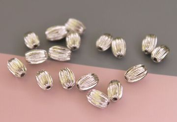 Бусины 7х5 граненые