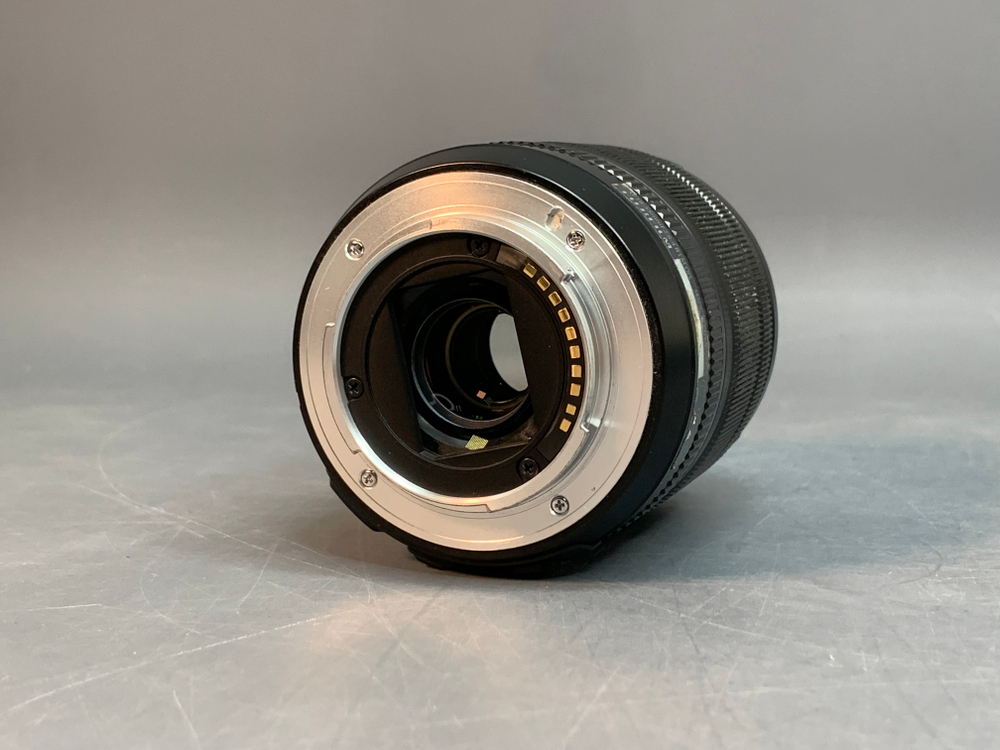 FujiFilm XF 18-55mm 2.8-4 R LM OIS, маленький точка на передней линзе