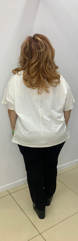 Нарядный белый блузон с кулиской и зеленым принтом