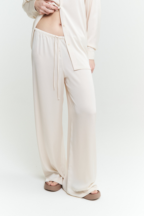 Шелковые брюки молочные