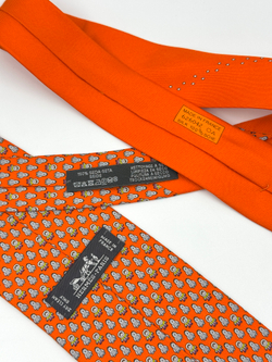 Галстук оранжевый с пингвинами Hermes