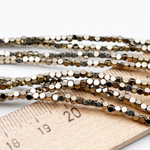 Гематит Многогранник бусины (имитация), цвет золотистый, размер около 1,9 мм, цена за отрезок 19 см (1/2 нити)