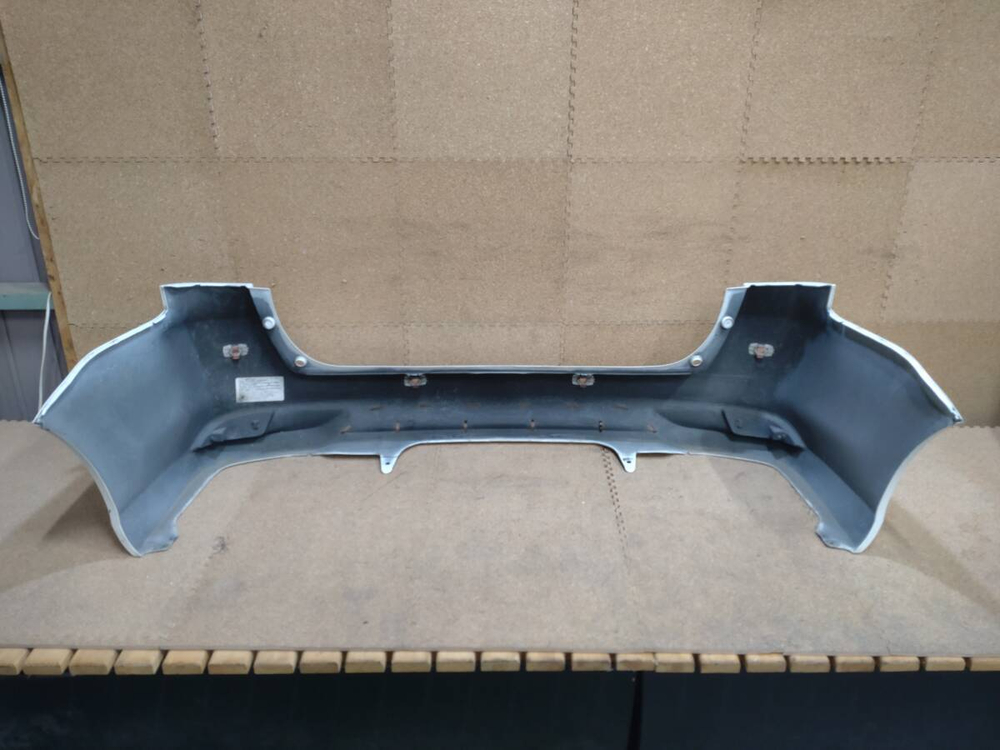 бампер задний Toyota Corolla Fielder NZE161 164