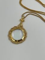 Кулон Лупа Joan Rivers