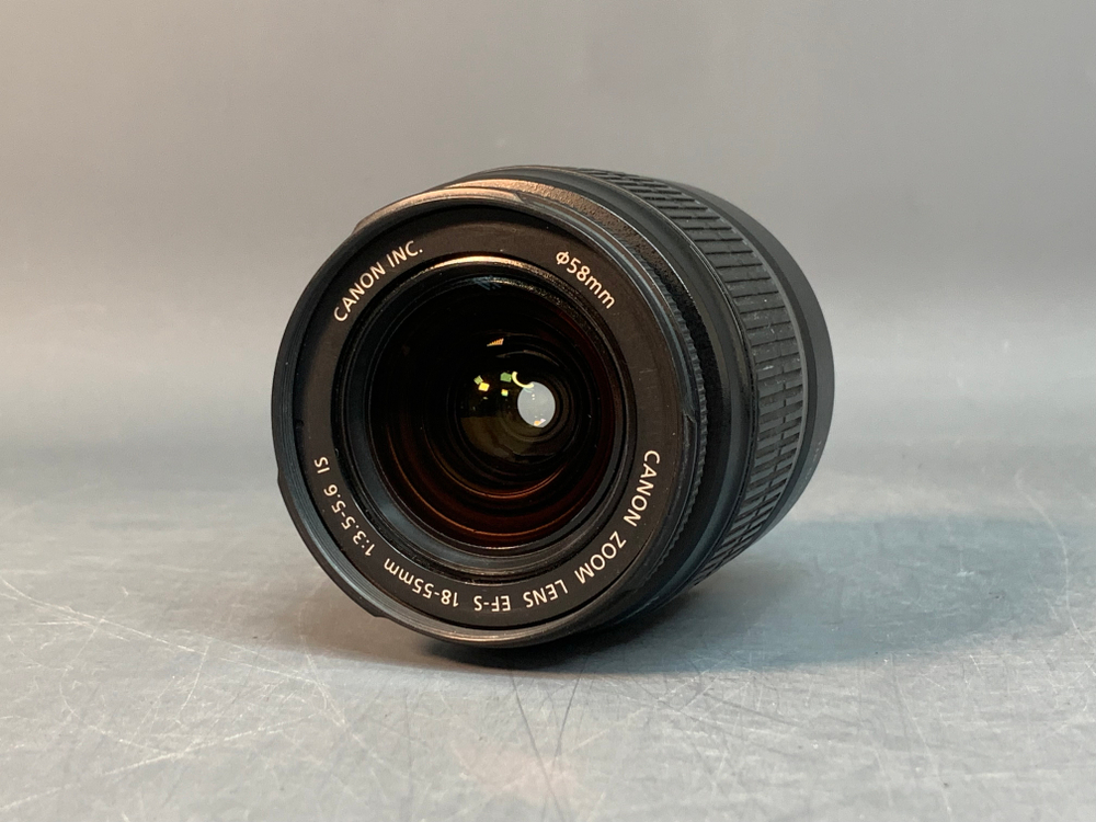 Canon EF-S 18-55mm 3.5-5.6 IS, царапка на передней линзе