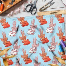 Ткань оксфорд 600 золотые и белые рыбки на голубом фоне