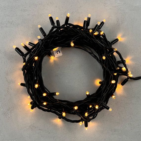 Светодиодная гирлянда с колпачком 75 экстра теплых белых LED ламп 10 м., 24В., черный каучуковый провод, IP65, LTC (LL75-1-1EWW)