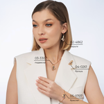 Подвеска «Мелодия ночи» из комбинированного золота с топазами