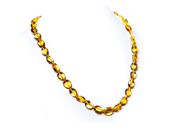 Бусы из янтаря натурального. Длина 45 см, бусины 8 на 5 мм. Янтарные бусы женские лечебные