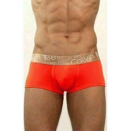 Мужские трусы хипсы рыжие с золотистой резинкой белыми буквами Calvin Klein Bronze Boxer Italics