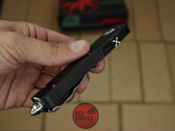 Нож Microtech Ultratech TFS/E - черная рукоять, клинок серрейторный RK-401