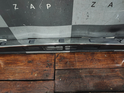 Накладка крышки багажника Geely Tugella 19-нв Б/У Оригинал 5062040200