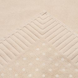 Коврик для ванной с фактурным бортиком кремового цвета из коллекции Essential, 50x80 см