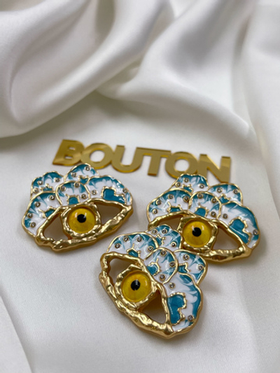 Пуговицы со стразами Скиап. золотистые в форме глаза с белой и бирюзовой эмалью