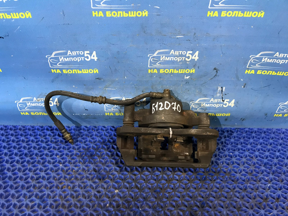 Суппорт тормозной передний левый MAZDA PREMACY 1999-2005