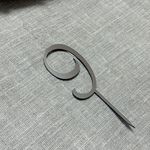 Свеча-топпер цифра «9» в серебряном цвете