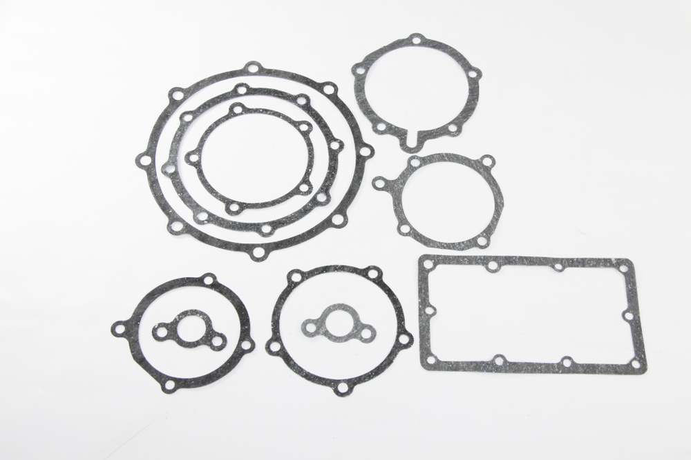 Набор прокладок на раздаточную коробку УРАЛ (4320/375-1802001-9НПАР.  9 наим.) паронит 0,6мм. (4320-1802001) (Состав анологичен 4320/375-1802001-9НПК) (Москва) ( ОЕ 04-15-211 )