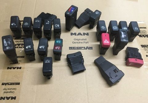 Кнопки на торпеде, подогрев сидений, регулировка фар МАН