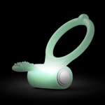 Эрекционное кольцо с вибрацией Dorcel POWER CLIT PHOSPHO на батарейках, светящееся