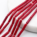 Коралл тонированный бусины, размер около 10*2,7 мм, цена за 18-19 шт (1/2 нити)