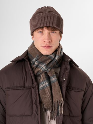 Хлопковая шапка в коричневом цвете