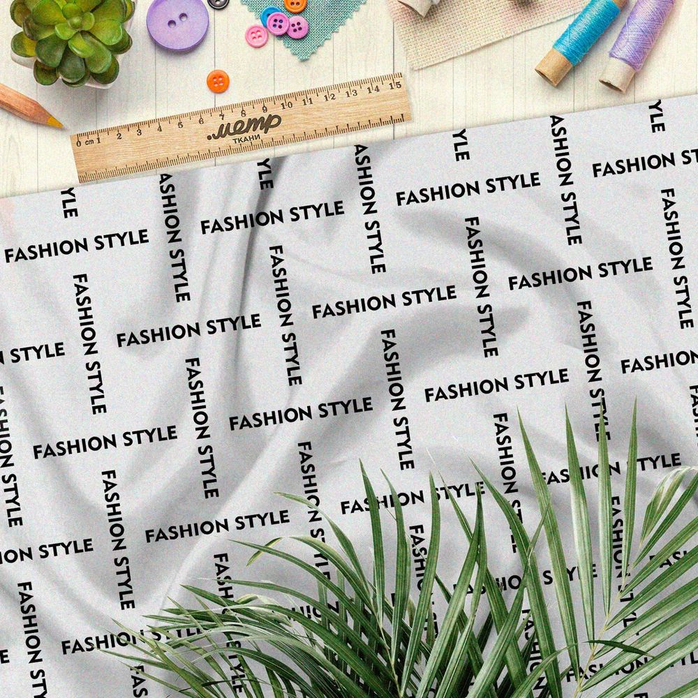 Ткань оксфорд 210 стильная клетка из чёрных надписей на бежевом фоне