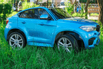 Детский двухместный электромобиль "BMW X6M" JJ2199 12V