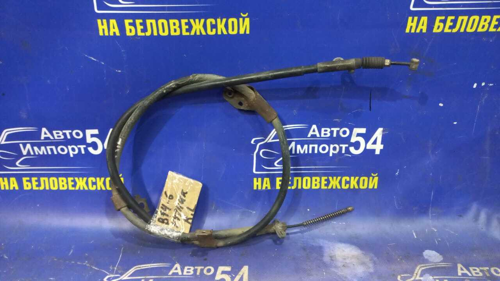 Трос ручника левый NISSAN SUNNY 1998