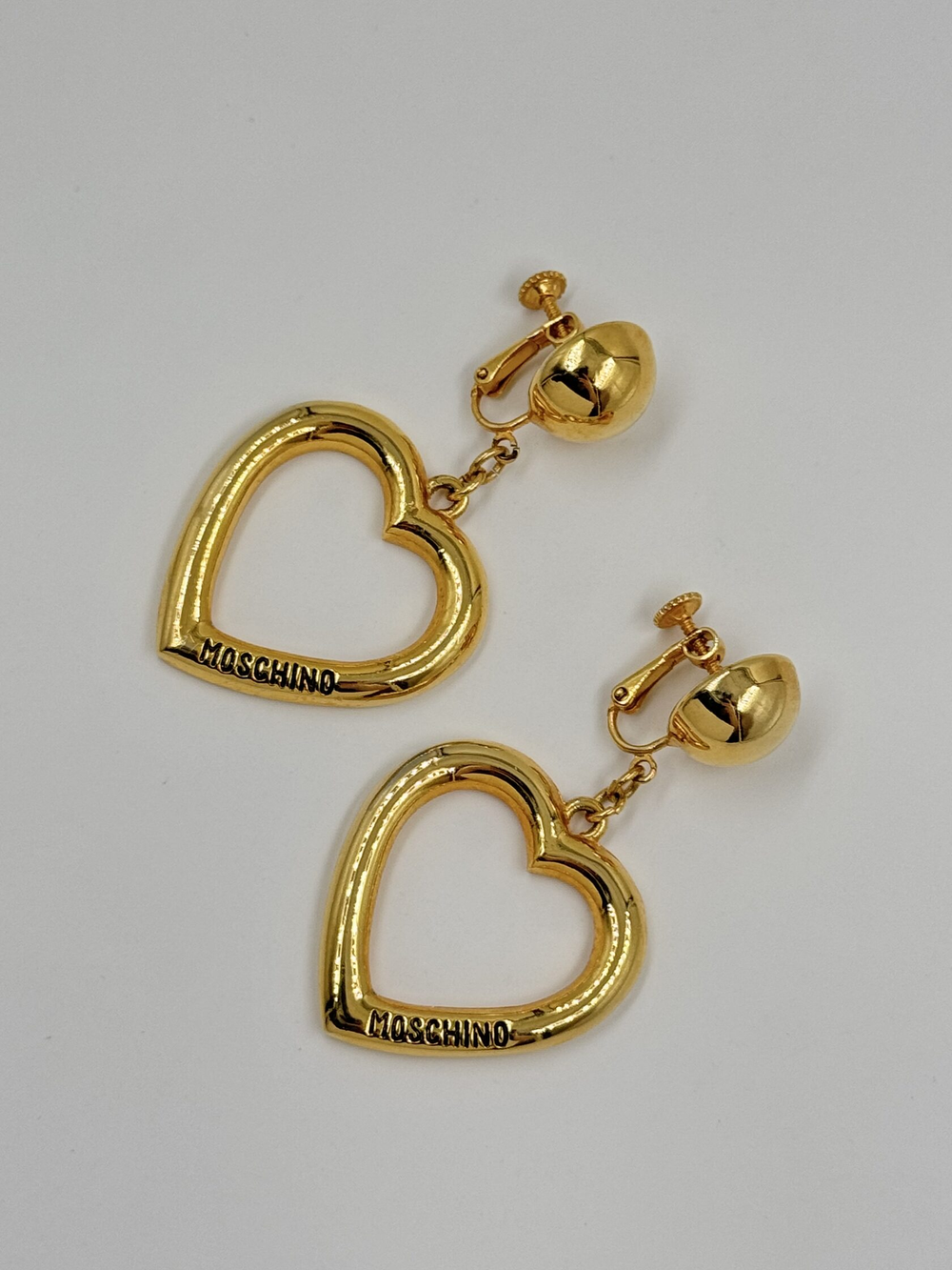 Клипсы с подвесками в виде сердец Moschino