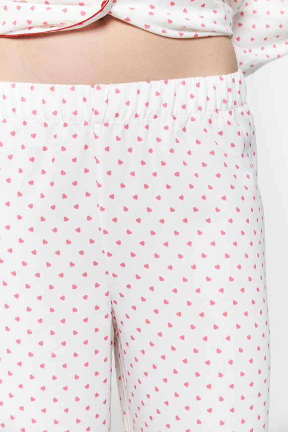 Брюки из вискозы с кантом и сердечками