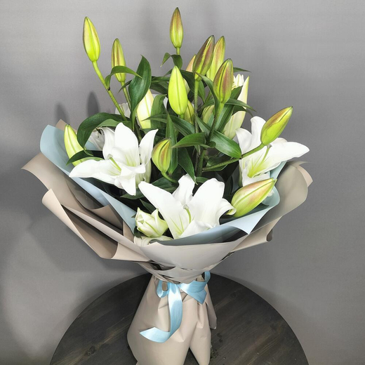 Букет из лилий в упаковке