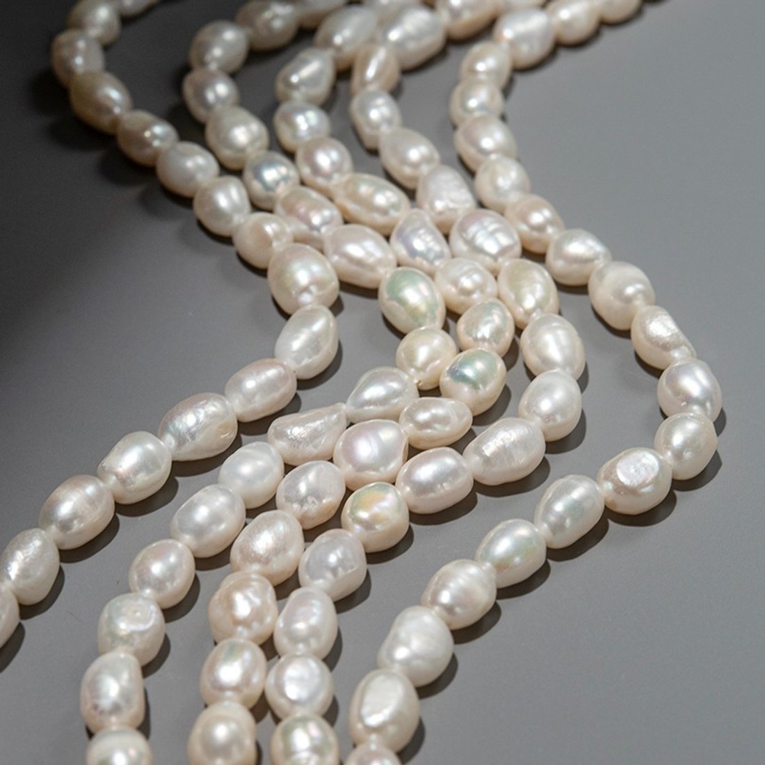 Жемчуг культивированный овальный белый, 9-10*7-8мм