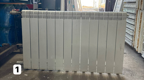 Биметаллический радиатор Б/У 500 12 секц. бок.