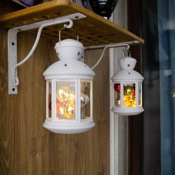 ULD-L1220-012-TTB-WW WHITE Фонарь со светодиодной гирляндой внутри. на батарейке в комплект не входит. 12 светодиодов. Теплый белый свет. Режим мерцания. Белый корпус. 12x20 см. TM Uniel.