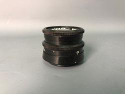 Praktica + Biometar 5,8cm 1:2, зеркало исцарапано, присутствуют пузырьки воздуха.