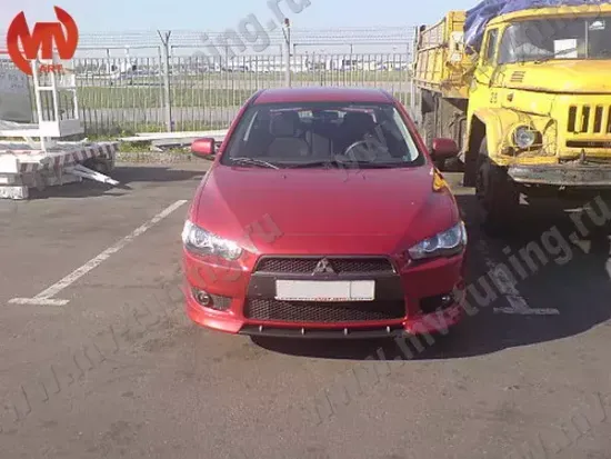 Зубатка между передними клыками для Mitsubishi Lancer 10