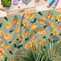 Ткань габардин апельсины на зелёном фоне