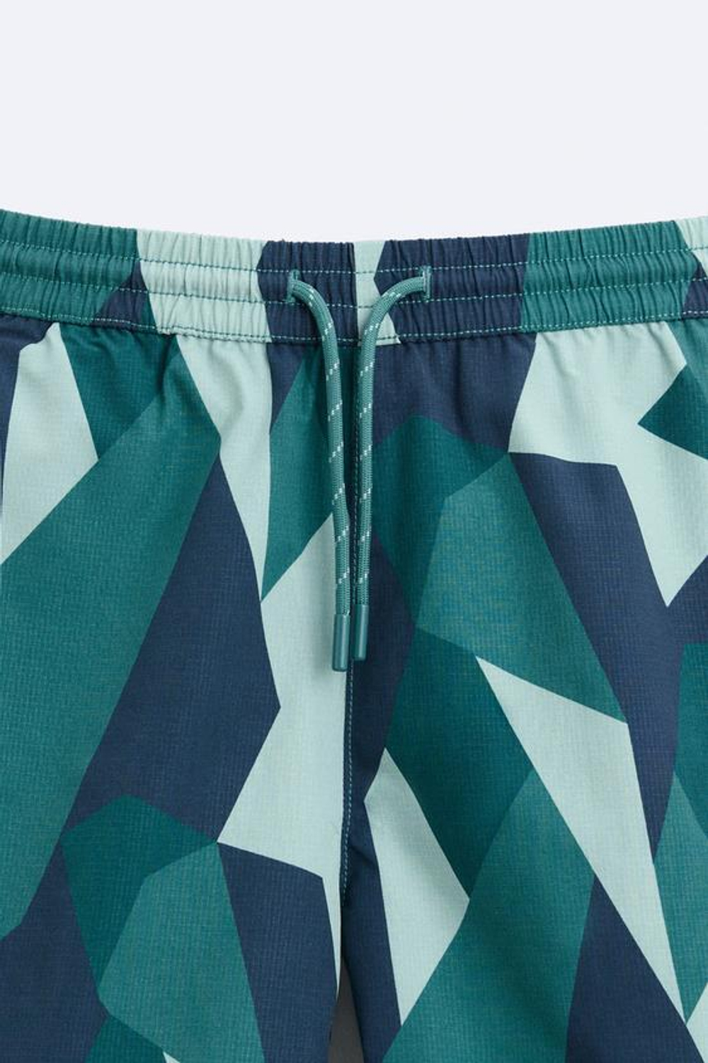 ZARA ДЛИННЫЕ ПЛАВКИ ИЗ ТКАНИ С АБСТРАКТНЫМ ПРИНТОМ, СИНЕ-ЗЕЛЕНЫЙ