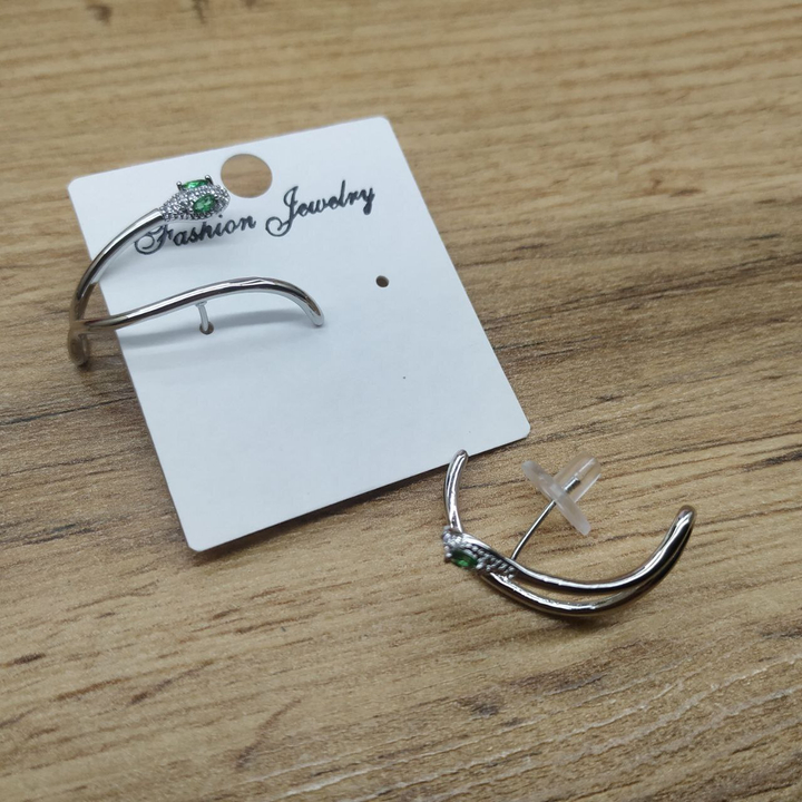 Серьги-гвоздики вокруг уха Змея циркон глаза зеленые металл серебристый