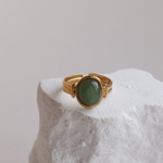 Кольцо с зеленым цирконием