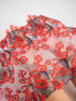 Вышивка на сетке белая с черным и красно-оранжевым неэластичная ширина 23 см