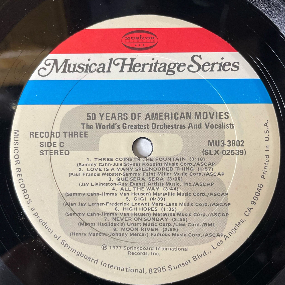 Винтажная виниловая пластинка LP Сборник Музыка Из Американских Фильмов 50 Years Of American Movies (USA 1977) (Star Wars, Gonna Fly Now, Moon River)