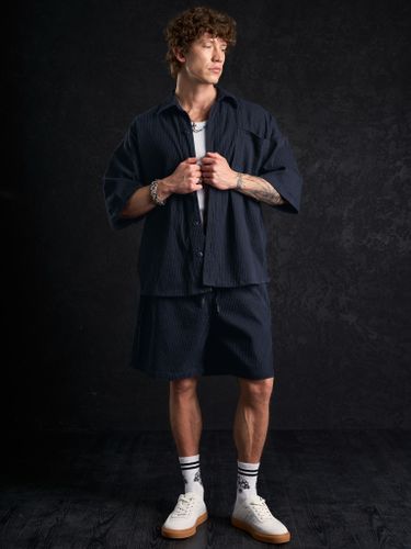 Синий хлопковый костюм в рубчик