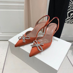 Amina Muaddi Pumps