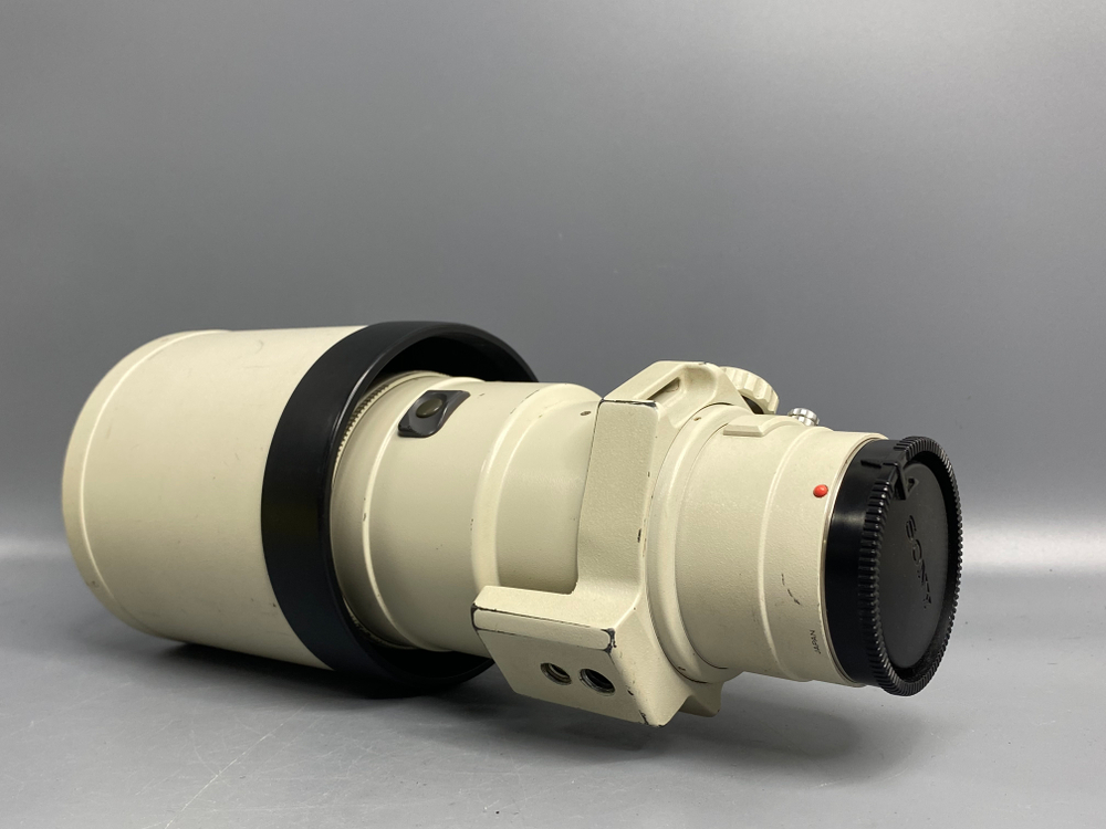 Minolta AF APO TELE 400mm f/4.5 G точечки под линзой