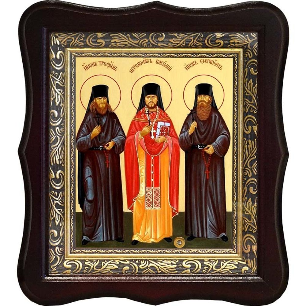 Икона Оптинских Новомучеников на холсте с мощевиком.